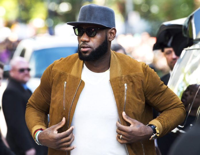 Los Angeles Laker LeBron James with shades and a baseball hat