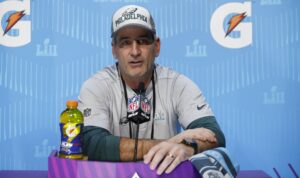 Frank Reich giving an interview during the Super Bowl LII Opening Night in 2018