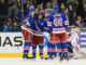 New York Rangers Win NHL Draft Lottery New York Rangers players celebrate after scoring a goal in 2018