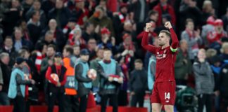 Jordan Henderson with Liverpool celebrates a 4-0 victory over FC Barcelona in 2019
