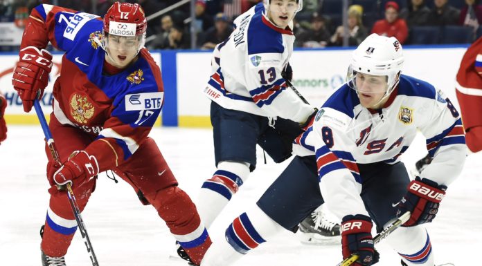 Adam Fox (8) with USA Hockey.