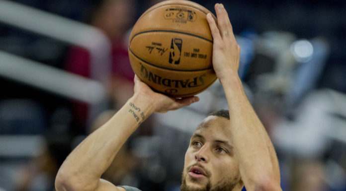 Golden State Warriors guard Stephen Curry at a Warriors vs Magic game in 2017