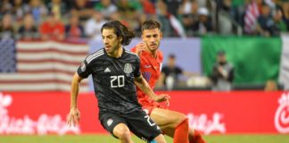 Rodolfo Pizarro (20) with Mexico's national team during a Mexico vs United States game in 2019