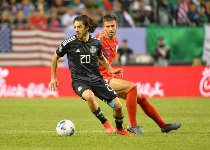 Rodolfo Pizarro (20) with Mexico's national team during a Mexico vs United States game in 2019