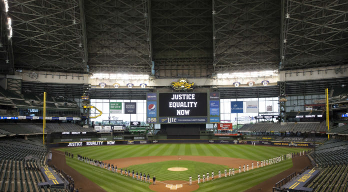 Players line up for opening day introductions for Major League Baseball game between the Milwaukee Brewers and the Chicago White Sox