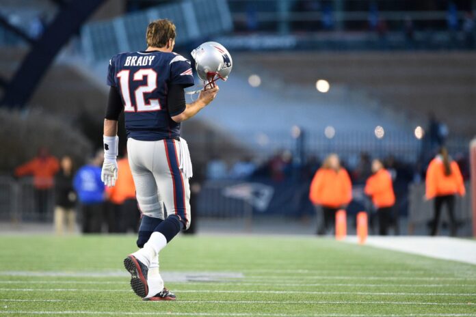 Quarterback Tom Brady comes off the field during the NFL game between the Detroit Lions and the New England Patriots last week.