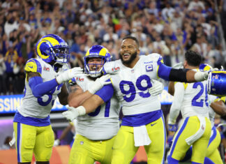 Los Angeles Rams defensive end Aaron Donald (99) celebrates win at Super Bowl LVI.