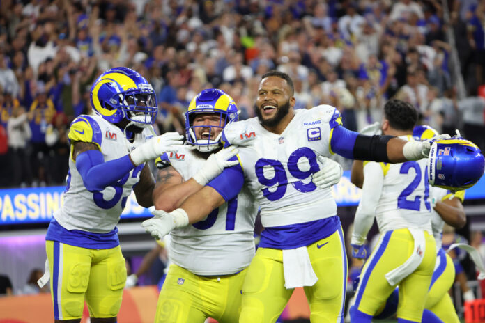 Los Angeles Rams defensive end Aaron Donald (99) celebrates win at Super Bowl LVI.