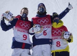 Alexander Hall, silver medalist Nicholas Goepper, and bronze medalist Jesper Tjader of Sweden after the Men's Freestyle Skiing Slopestyle finals at the 2022 Beijing Winter Olympics.