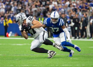 Khari Willis (37) chasing Raiders' tight end Foster Moreau