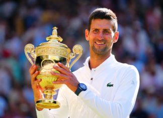 Novak Djokovic lifts the trophy after winning the Men's Singles FInal Wimbledon Tennis Championships in July 2022