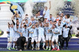 Lionel Messi of Argentina celebrates the victory with teammates after winning the Copa America 2021