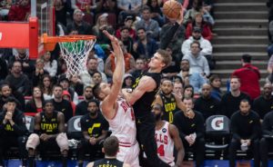 Lauri Markkanen (23 Utah Jazz) dunks the ball over Nikola Vucevic (9 Chicago Bulls) during the game between the Chicago Bulls and Utah Jazz in January 2023