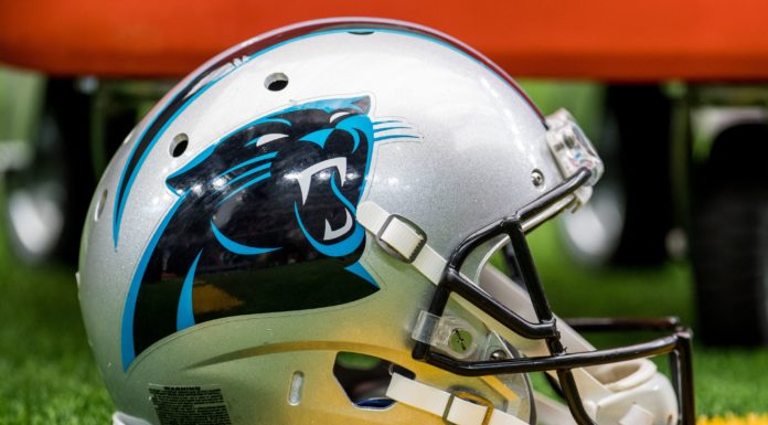 Carolina Panthers Hire Thomas Brown as Offensive Coordinator A Carolina Panthers helmet