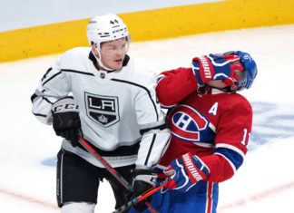 Los Angeles Kings' Mikey Anderson (left) and the Montreal Canadiens' Brendan Gallagher in 2021