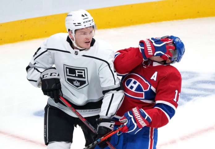 Los Angeles Kings' Mikey Anderson (left) and the Montreal Canadiens' Brendan Gallagher in 2021