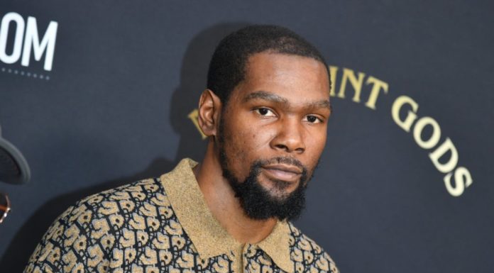 Durant Suns Debut Pushed Due to Knee Injury Setback Kevin Durant at the "Point Gods" premiere in July 2022