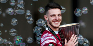 Declan Rice of West Ham United with the UEFA Europa Conference League Trophy in June 2023