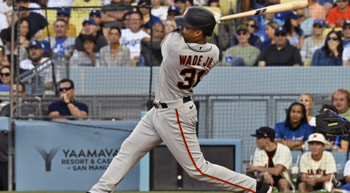 San Francisco Giants' LaMonte Wade Jr. hits a three-run home run in a Los Angeles Dodgers vs San Francisco Giants game in June 2023