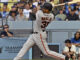 San Francisco Giants' LaMonte Wade Jr. hits a three-run home run in a Los Angeles Dodgers vs San Francisco Giants game in June 2023