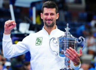 Novak Djokovic lifts the US Open trophy in September 2023