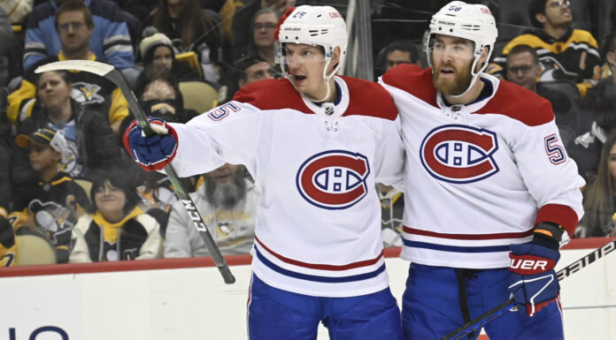 Montreal Canadiens' Denis Gurianov (25) and David Savard (58) in March 2023