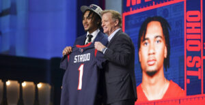 C.J. Stroud with NFL Commissioner Roger Goodell after being picked 3rd during the NFL Draft at Union Station in Kansas City, Missouri in April 2023