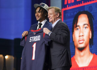C.J. Stroud with NFL Commissioner Roger Goodell after being picked 3rd during the NFL Draft at Union Station in Kansas City, Missouri in April 2023