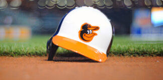 Baltimore Orioles batting helmet on the field at Orioles Park at Camden Yards