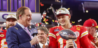 Kansas City Chiefs quarterback Patrick Mahomes (15) holds the Vince Lombardi Trophy after defeating the San Francisco 49ers 25-22 in Super Bowl LVIII in February 2024