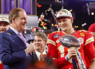 Kansas City Chiefs quarterback Patrick Mahomes (15) holds the Vince Lombardi Trophy after defeating the San Francisco 49ers 25-22 in Super Bowl LVIII in February 2024