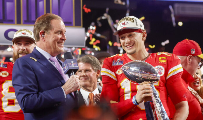 Kansas City Chiefs quarterback Patrick Mahomes (15) holds the Vince Lombardi Trophy after defeating the San Francisco 49ers 25-22 in Super Bowl LVIII in February 2024