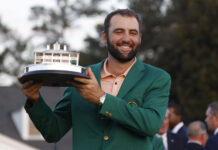 Scottie Scheffler holds the Masters Trophy after winning the Masters tournament at Augusta National Golf Club in April 2024