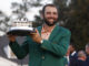 Scottie Scheffler holds the Masters Trophy after winning the Masters tournament at Augusta National Golf Club in April 2024