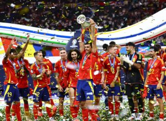 Rodri of Spain celebrates with the winners trophy Spain v England, UEFA European Championship 2024 in July 2024