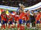 Rodri of Spain celebrates with the winners trophy Spain v England, UEFA European Championship 2024 in July 2024