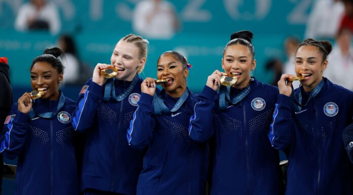 Team USA Wins Women’s Team Gymnastics Gold at 2024 Paris Olympics Simone Biles of USA and team mates celebrate winning the Gold Medal in the Artistic Gymnastics Women's Team Final Paris 2024 Olympic Games in July 2024