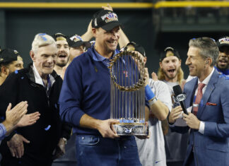 Texas Rangers general manager Chris Young holds the World Series trophy after the Rangers defeated the Arizona Diamondbacks in January 2023
