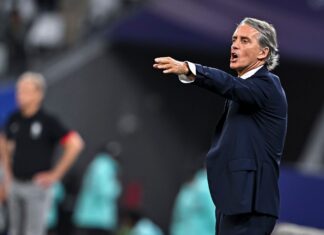 Roberto Mancini coaching Saudi Arabia during a match with South Korea in 2024